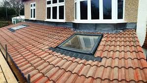Velux roof window fitted to slate roof with lead flashing in Stoke-on-Trent